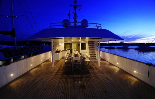 alfresco dining at night on board superyacht BERZINC 