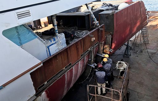 pullumbo shipyard workers in Italy working on superyacht commitment as she undergoes her refit