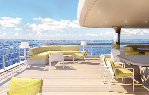 al fresco seating and dining areas on the deck of motor yacht AQUARIUS 