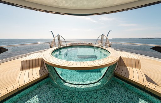 Deck Jacuzzi onboard superyacht charter KISMET with views of the sea