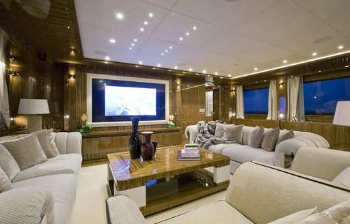 upper lounge with cinema setup on board luxury yacht OKKO 