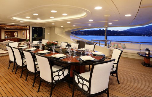alfresco dining area on the upper deck aft of charter yacht ULYSSES 