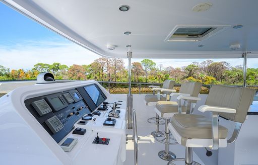 Second helm station onboard charter yacht NEXT CHAPTER