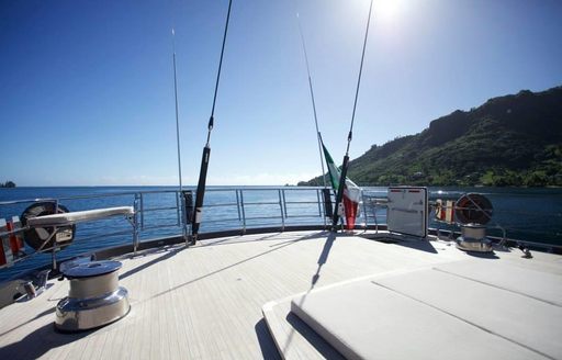 Fishing rods on the aft deck of sailing yacht OHANA