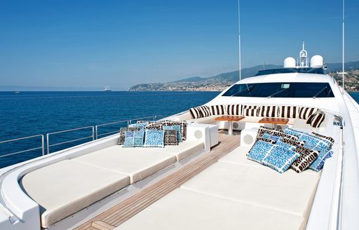 sunpads and seating area on foredeck aboard motor yacht Tutto le Marrané