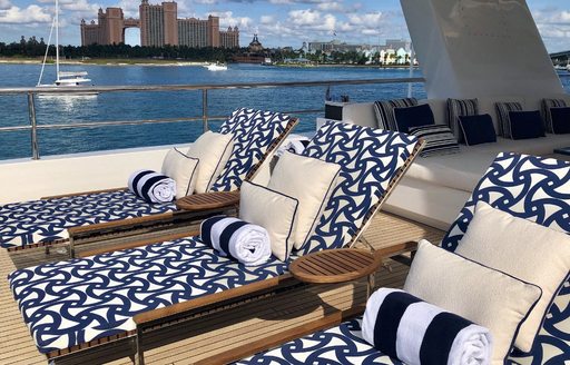 sun loungers line up on the sundeck of motor yacht TANZANITE 