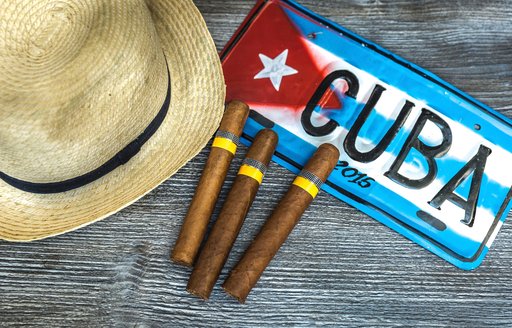 Hat, cigars and cuban number plate