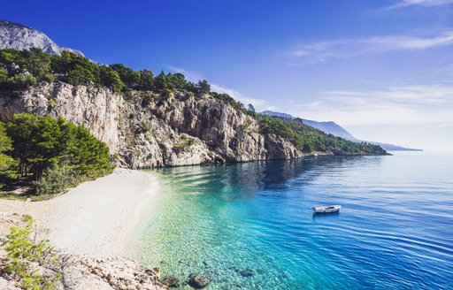 Beautiful bay in Croatia, with blue water and white sandy beach
