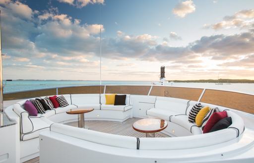 circular seating area on the sundeck of motor yacht CHECKMATE 