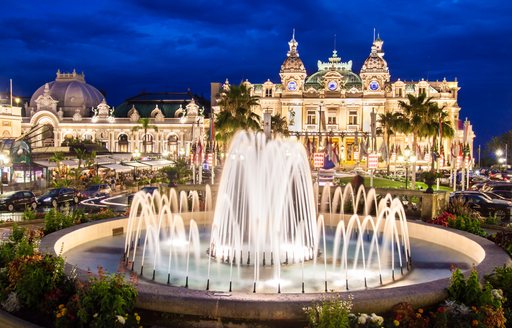 fountains and palace in monte-carlo, monaco at night