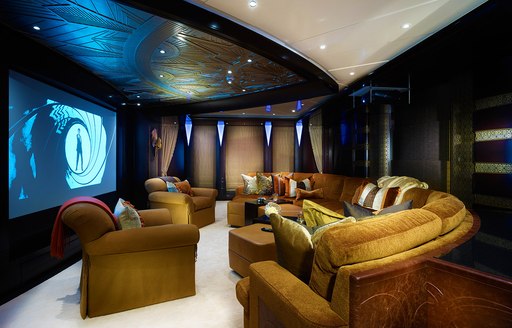 Club room converted into an intimate cinema room onboard charter yacht WHISPER