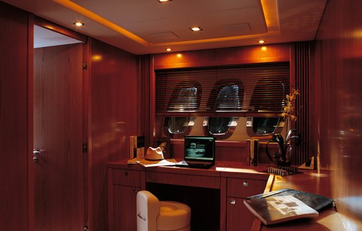 stylish study in master suite of charter yacht ‘Casino Royale’ 