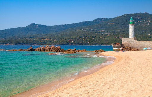 Sandy beach in the Mediterranean with turquoise Mediterranean sea