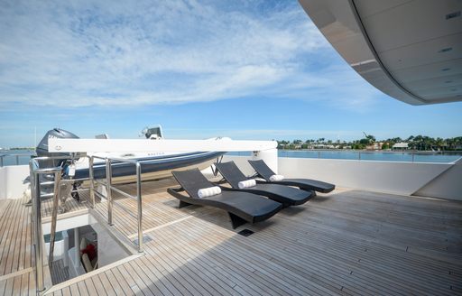 Sun loungers on the sundeck of luxury yacht BRIO