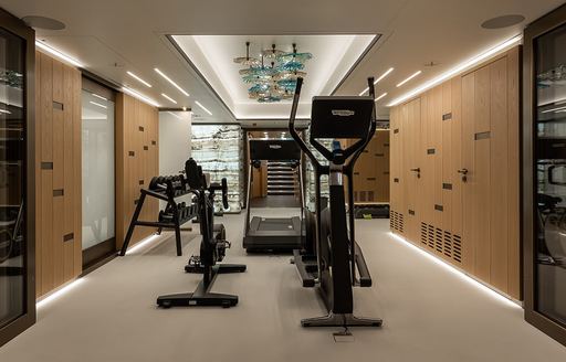 An equipped gym onboard charter yacht LA DATCHA