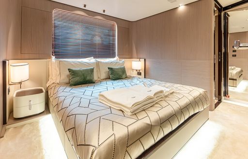 Guest cabin onboard charter yacht VESTA, central berth facing forward with access to private en suite