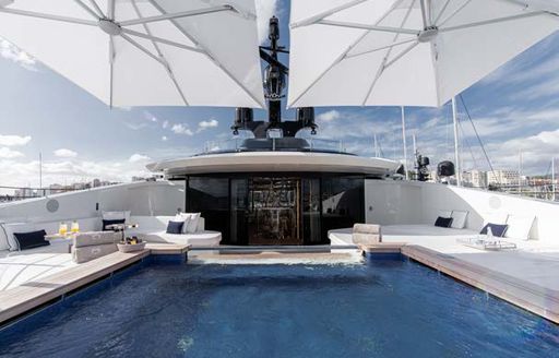 Swimming pool on board charter yacht RESILIENCE