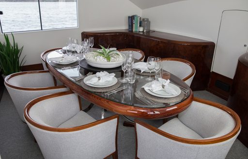 dining table for six in main salon of charter yacht ‘Laura J’ 