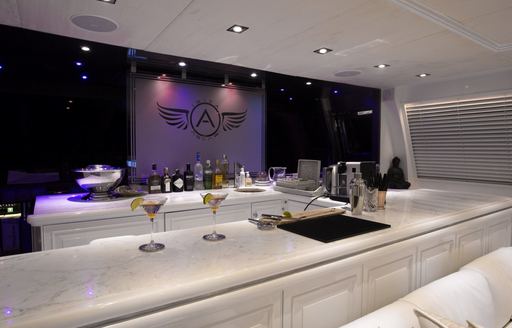 Cocktail lounge and marble bar on charter yacht ascari I
