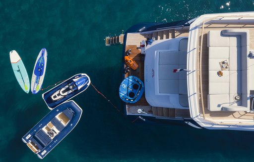 View from above of luxury yacht ARSANA with tenders near swim platform