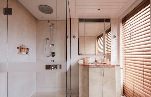 A pink bathroom on board luxury yacht JOY