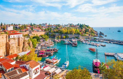 Old town (Kaleici) in Antalya, Turkey, with gulets berthed in harbour