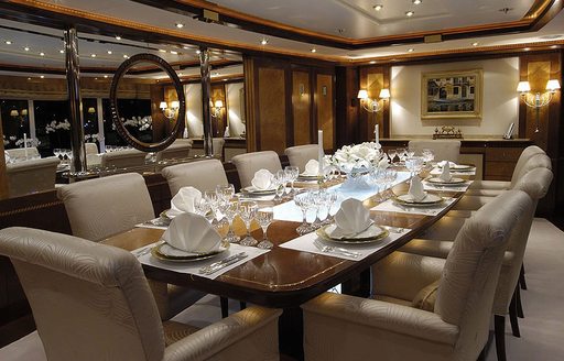 Formal dining area in the main salon onboard motor yacht LADY MAJA I 