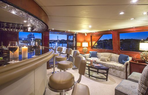 bar and lounge area in skylounge of charter yacht ‘Sweet Escape’ 