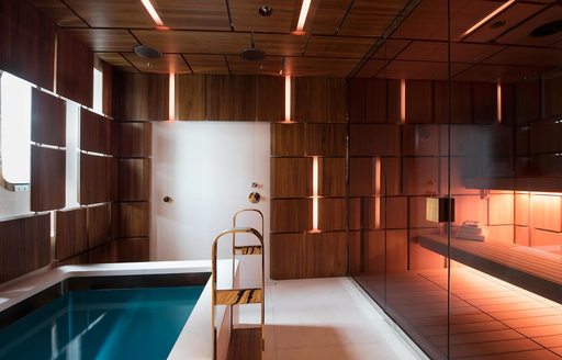 A spa pool and the sauna area on board a superyacht