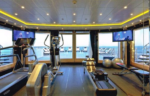 Gymnasium with a view on board charter yacht PHOENIX 2
