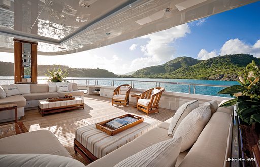 Sofa seating area on luxury yacht INVICTUS