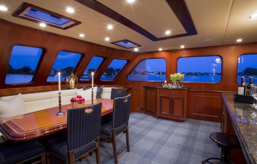 The central interior dining space on board luxury yacht NORDFJORD