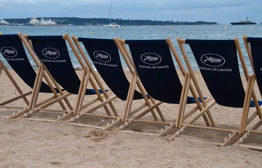 Deck chairs lined up on a beach at the Cannes Film Festival