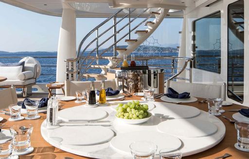 Alfresco dining on board charter yacht KAMALAYA