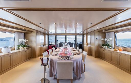 beautiful dining salon on upper deck of luxury yacht FERDY 