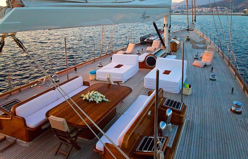 dining area and lounging options on the foredeck of luxury yacht REGINA 