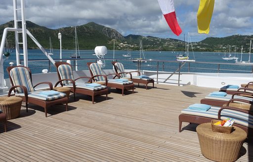 sun loungers line up on the sundeck of charter yacht Lauren L 