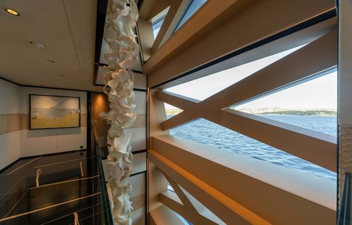 X-shaped windows on board charter yacht PROJECT X