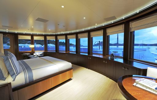 master suite with panoramic views on board luxury yacht TV