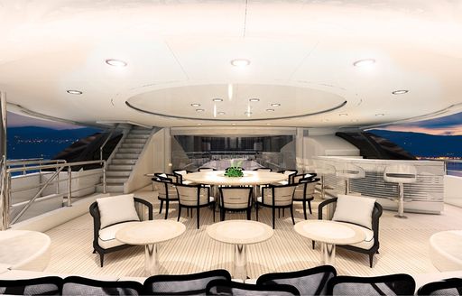 Superyacht O’Pari 3's sheltered al fresco dining and seating area on main deck