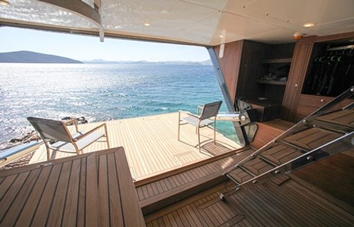 swim platform with chairs on board charter yacht Rox Star