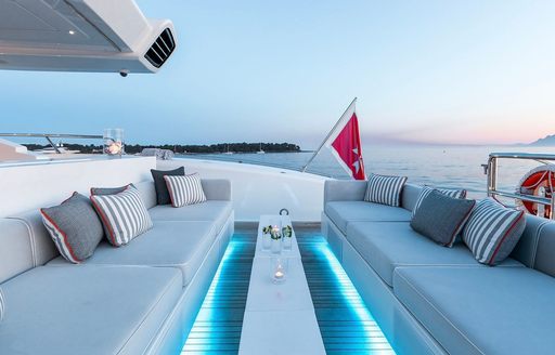 Sofas on the aft deck of charter yacht BEACHOUSE with underlights