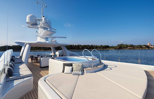 deck space and jacuzzi offering beautiful views for charter guests to enjoy