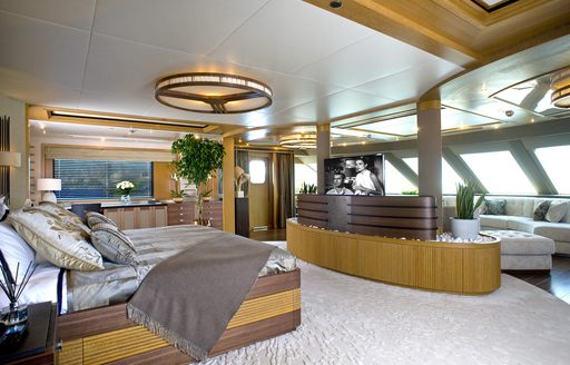 master suite with raised bed and lounge area on board charter yacht ‘Indian Empress’ 