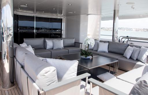 sumptuous outdoor lounge on the main deck aft of superyacht ‘Princess AVK’ 