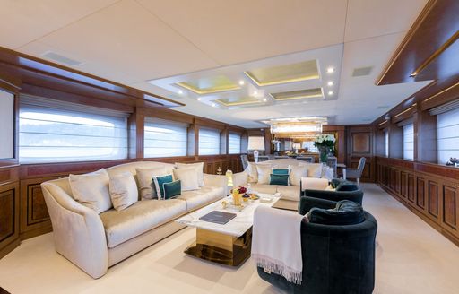 Bright white furnishings and carpet inside superyacht LEGENDA