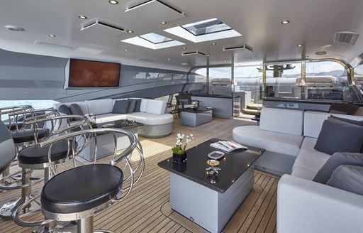 exterior suite with bar in foreground on luxury yacht grey matters