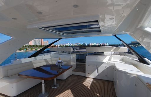 seating under retractable sun roof on board motor yacht PERPETUAL