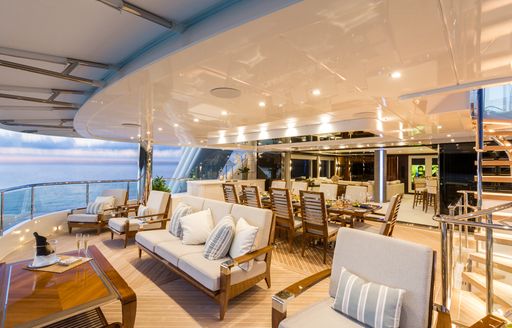 Seating and alfresco dining area on upper deck aft