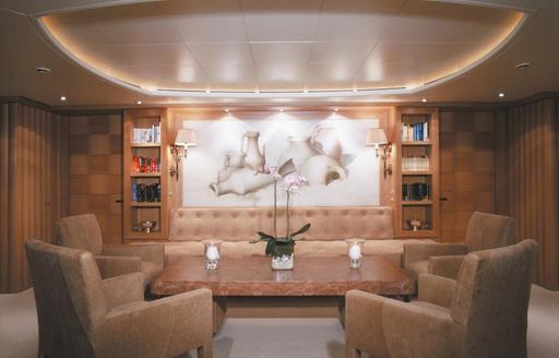 Formal interior dining on board luxury yacht ALEXANDRA